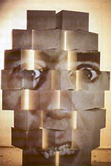 TONY OURSLER, Digital, 1997 (proiezione su ventitre cubetti di legno)